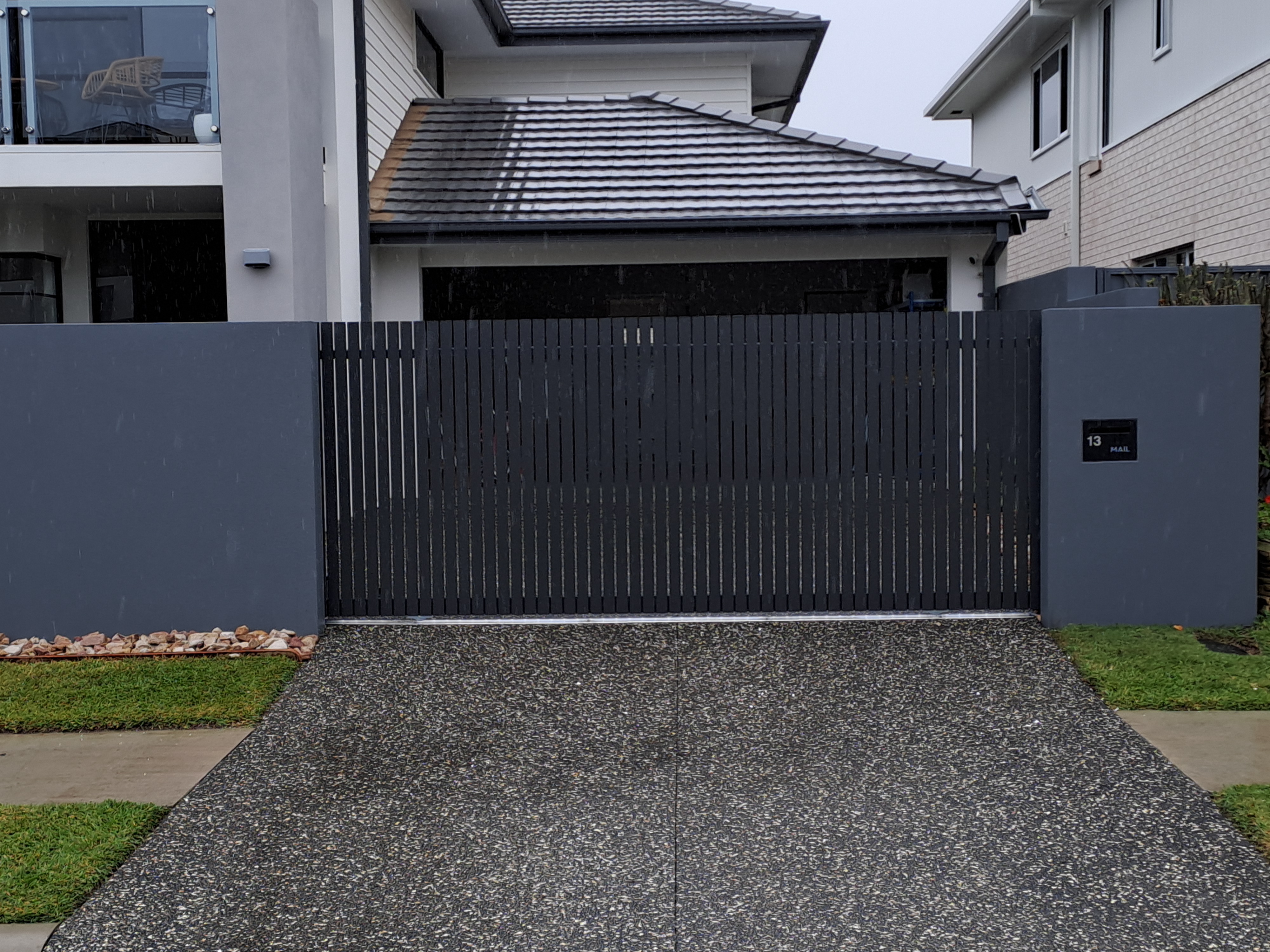 Grey vertical slat aluminium fencing built for a Moreton Bay residential property - Gateflex, Caboolture